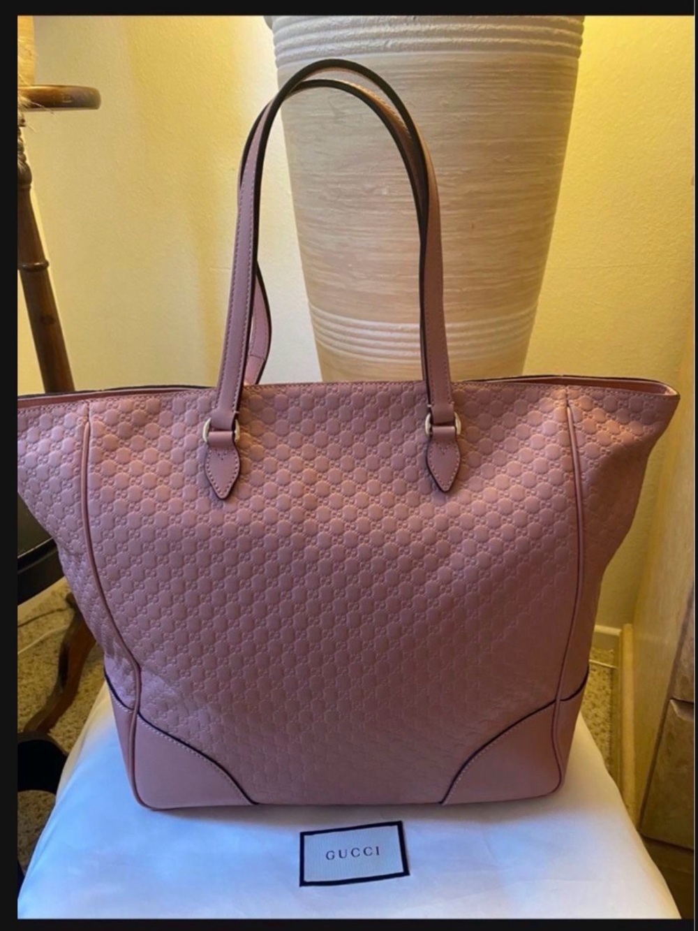 Gucci Microguccissima Bree leather tote bag is rendered in a soft pink hue